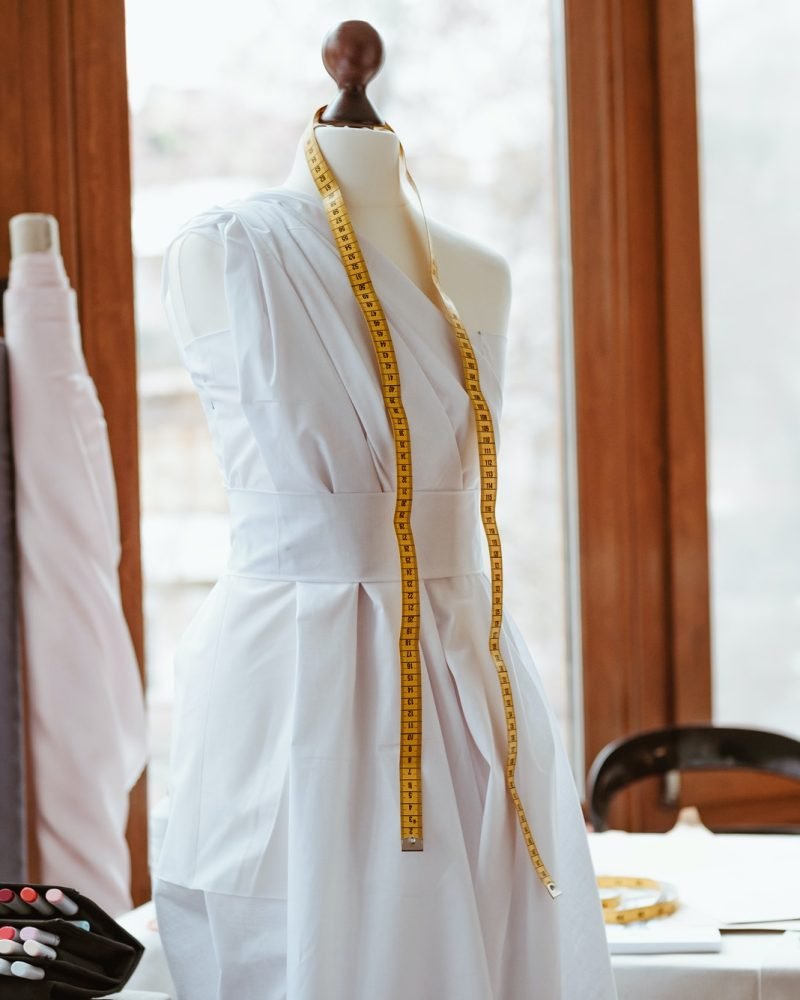 mannequin-with-wedding-dress-and-measure-tape.jpg
